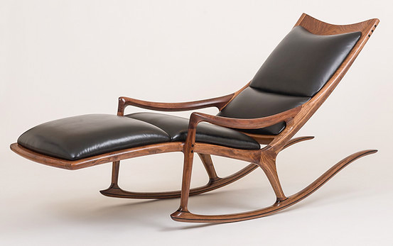 Elegant wooden table with smooth curves and natural finish